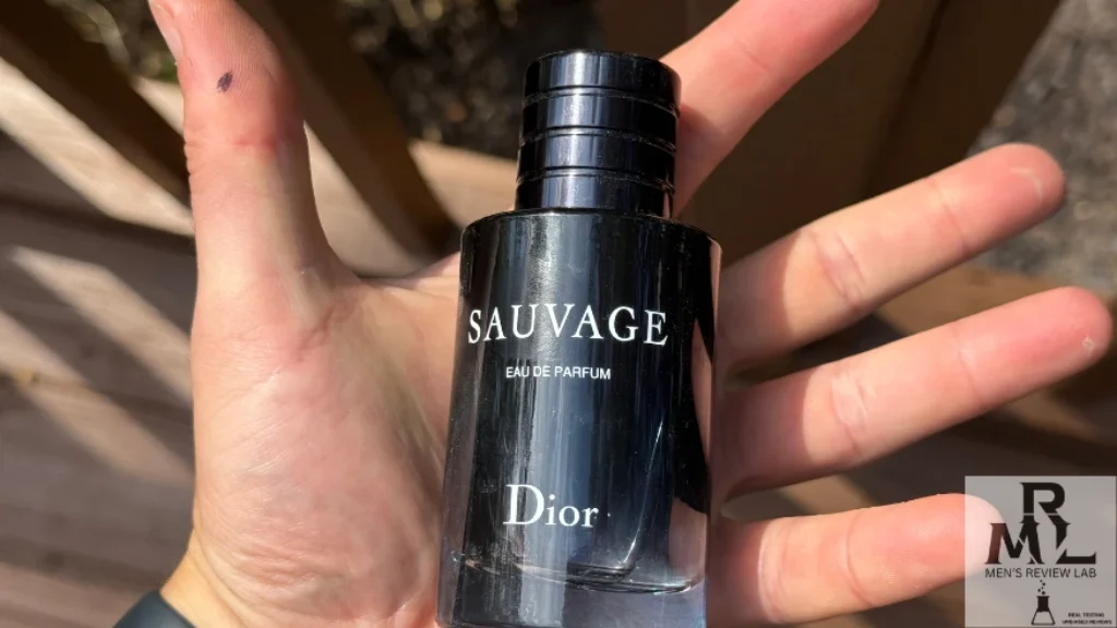 holding bottle of Dior Sauvage in my hand for size comparision